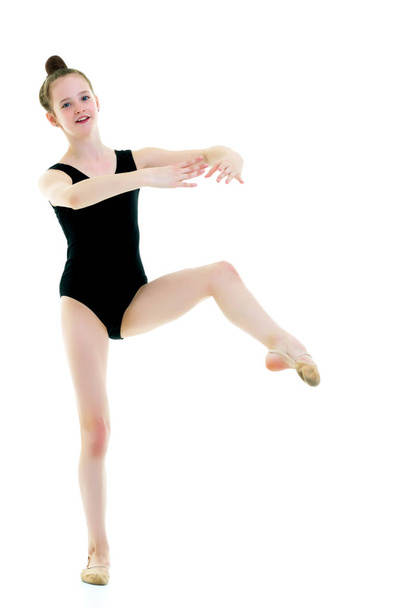 The gymnast perform an acrobatic element. - Фото, изображение