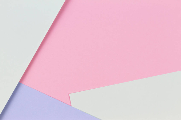 Abstraktní barevné papírové textury pozadí. Minimální geometrické tvary a linie v pastelové růžové, světle modré a zelené barvě - Fotografie, Obrázek