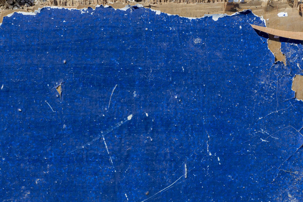 texture in legno di colore blu scuro, padella in legno graffiato e rotto
 - Foto, immagini