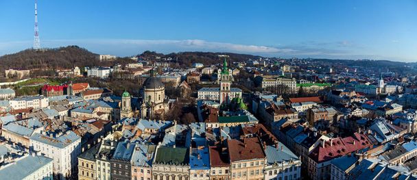 A beautiful aerial view of colorful traditional roofs of houses in Lviv - Foto, imagen