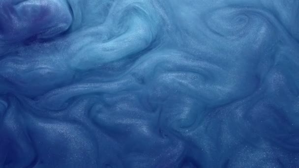 csillámló folyadék mozgás csillogó kék festék örvény - Felvétel, videó