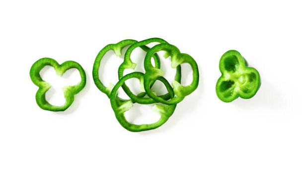 Gree sliced bell pepper isolated on white background top view. - Fotoğraf, Görsel