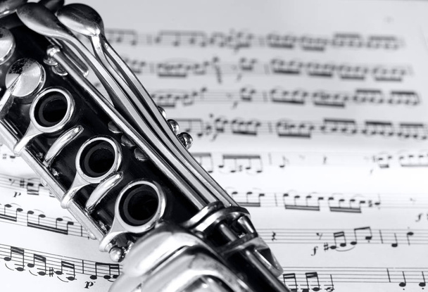 clarinete em fundo partitura música
 - Foto, Imagem