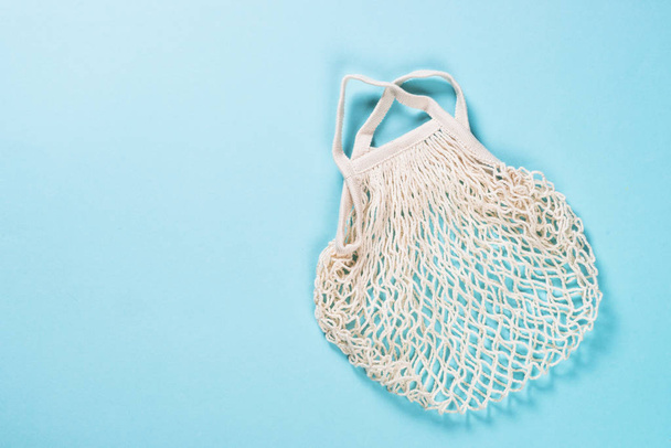 Mesh bag for zero waste shopping on color background. - Photo, image