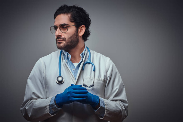 Portrait of young attractive medic in glasses - 写真・画像