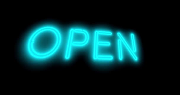 Otevřený nápis v zářícím neonu a osvětlený u vchodu do obchodu. Nástěnka pro komerční nebo maloobchodní prodejnu - 4k - Záběry, video