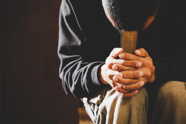 Portrait of a man praying with his eyes closed. - Fotoğraf, Görsel