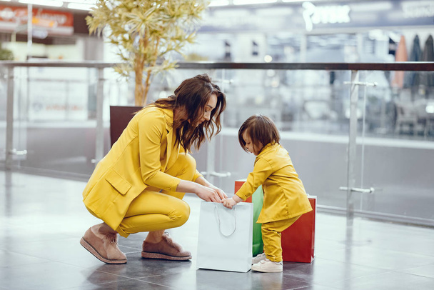 Mother and daughter with shopping bag - Photo, image