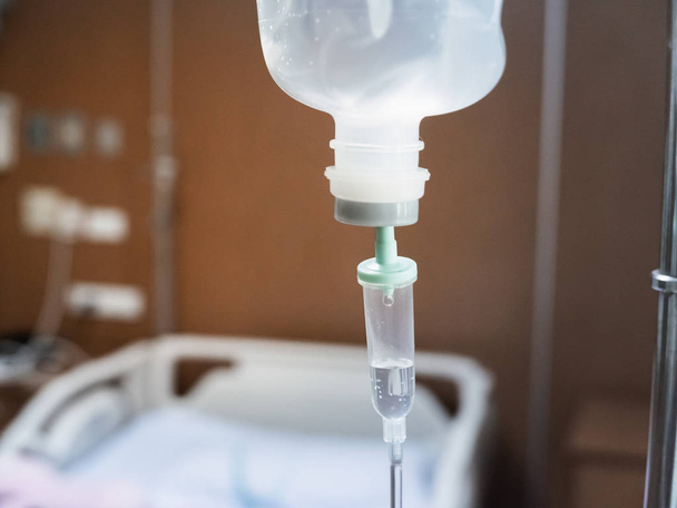 Saline iv drip fluid intravenous drop hospital room,medical conc - Foto, afbeelding