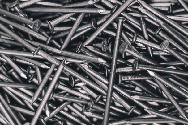 Building accessories nails or screws. - Фото, зображення