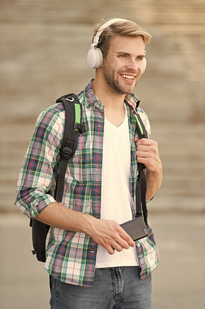 College education concept. College life. College student headphones smartphone. Online course. Audio book concept. Educational technology use physical hardware software and educational theoretic - Foto, Imagem