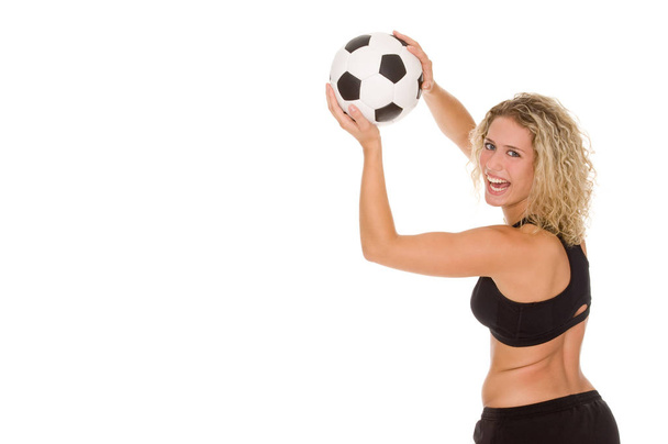 young woman with soccer ball isolated on white - Фото, изображение