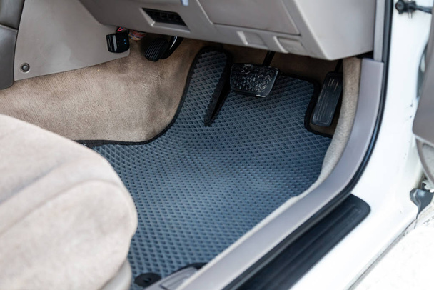 Dirty car nano floor mats of gray plastic rubber diamond-shaped  - Photo, Image