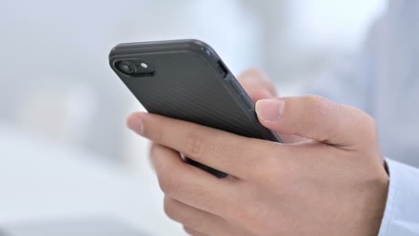 Close Up of Hand Using Smartphone, Browsing Online - Footage, Video