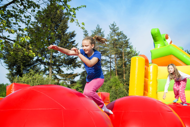 Happy Girls on Inflate Castle - Photo, Image