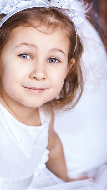Little cute girl sale portrait. Photography of luxury female child. Happy winner emotion. Fresh person face. Kid eyes. Look at camera - Фото, изображение