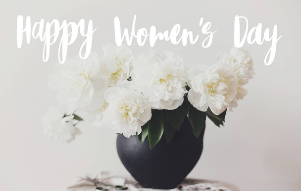 Happy Women's day text handwritten on stylish peony bouquet in b - Foto, Imagem