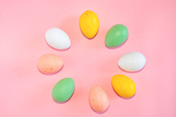 Colorful easter eggs on pink background - Photo, Image