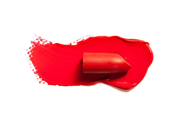 Texture of classic red lipstick on a white background close-up. - Photo, Image