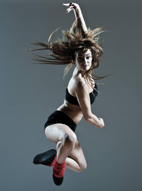beautiful young woman leap jump - 写真・画像