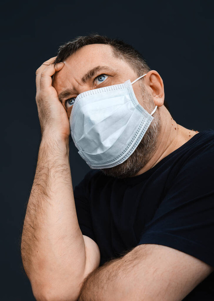 Man with medical face mask. Coronavirus epidemic. - Photo, Image