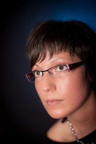 portrait of woman with glasses - Photo, image