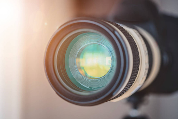 Close up of professional photo camera on a tripod, lens - Photo, Image