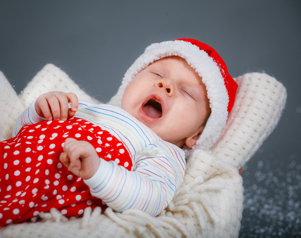 Baby in a santa suit. - Photo, Image