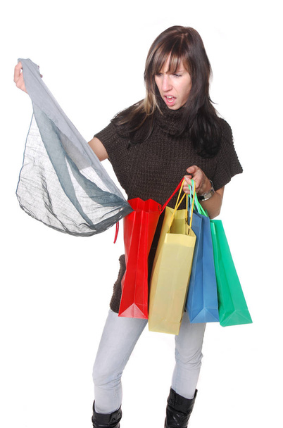 young woman with shopping bags isolated on white - Фото, зображення