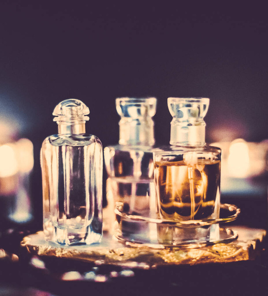 Perfume bottles and vintage fragrance at night, aroma scent, fra - Photo, Image