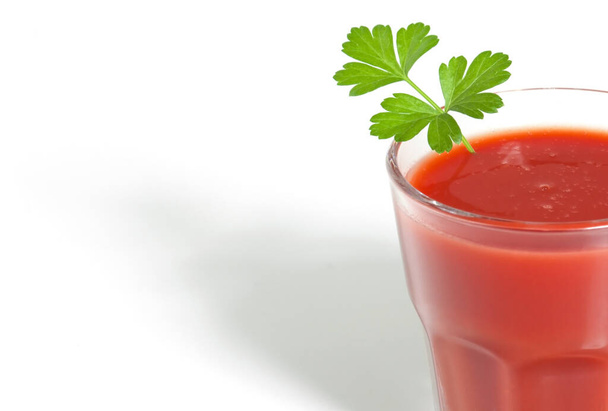 glass of tomato juice with fresh tomatoes on white background - Zdjęcie, obraz