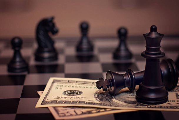 Dollars, chess. Concept of losing and winning - Foto, Imagen
