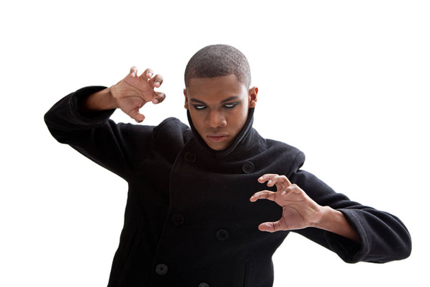 young man in black suit and tie showing stop gesture - Photo, image
