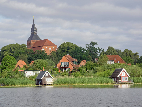 Cityscape of Sternberg with church and lake, Mecklenburg-Western Pomerania, Germany - 写真・画像