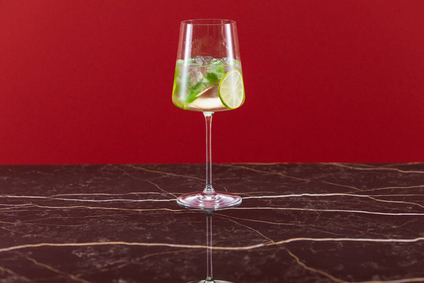 two glasses of champagne on a red background - Photo, Image
