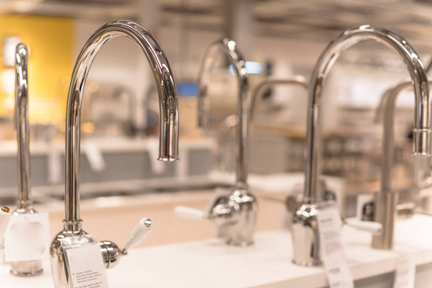 Brand new kitchen faucets at furniture showroom store showroom in Texas, USA - 写真・画像