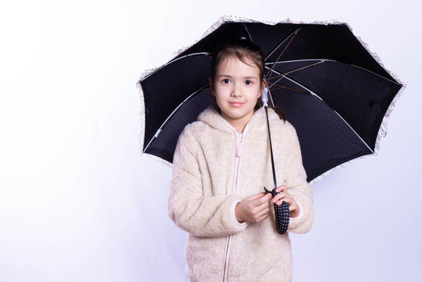 little girl with an umbrella  - Fotografie, Obrázek