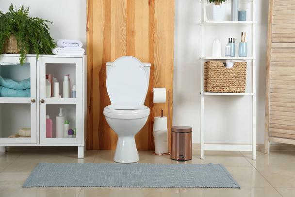 Stylish toilet bowl in modern bathroom interior - Фото, изображение