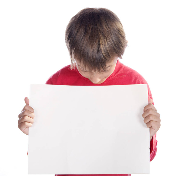 boy looking at placard - Фото, изображение