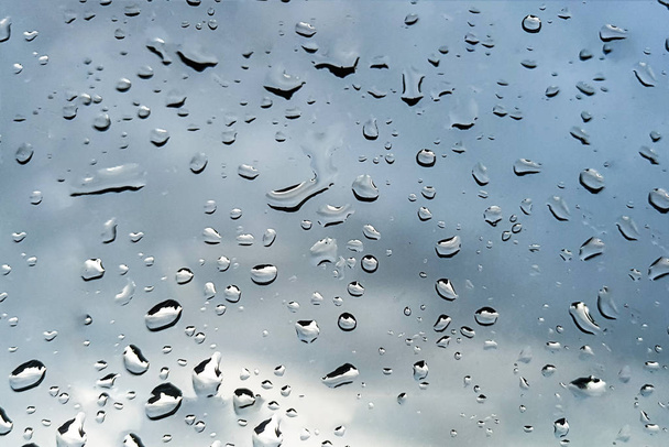 raining drops on the glass off window for background - Foto, Bild