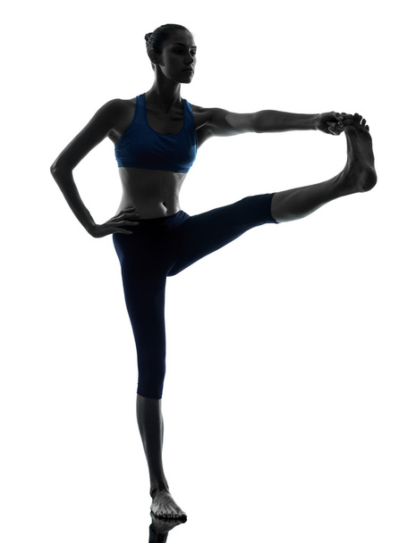 woman exercising yoga Hasta Padangusthasana - Foto, immagini