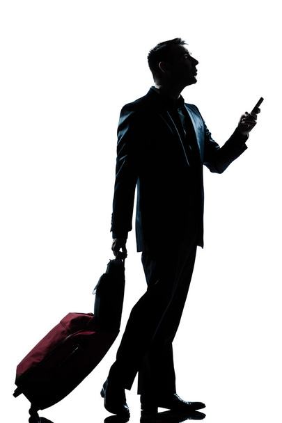 silhouette man walking on the phone full length - 写真・画像