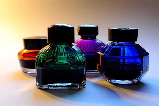 bottles of perfume on a black background - Photo, image