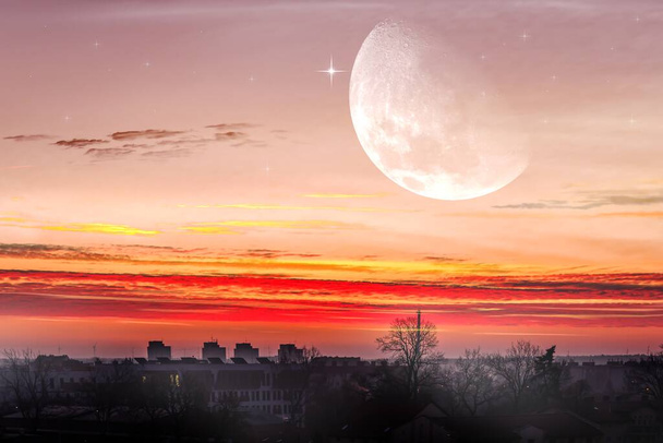 Moon in bright clouds of sunset sun . New moon .  The sky at night with stars.  - Photo, Image