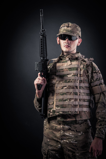 Modern soldier with rifle - 写真・画像