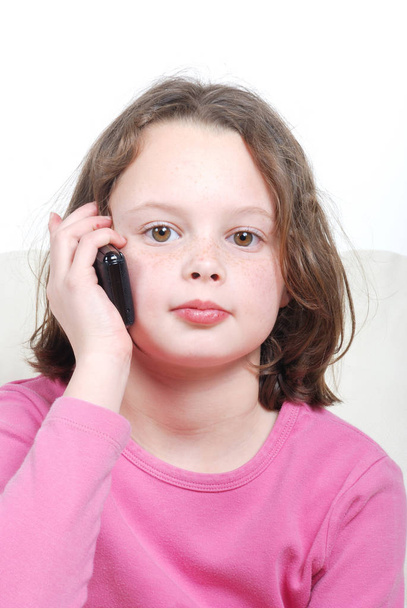 Girl with a mobile phone - Photo, Image
