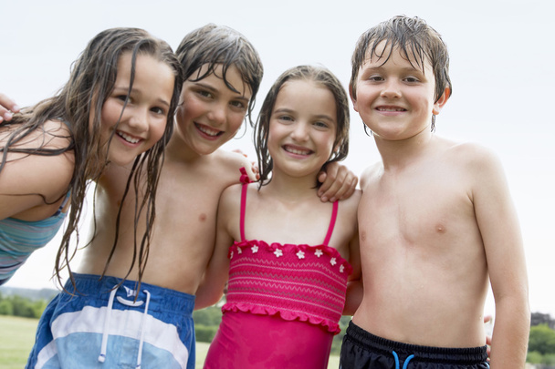 Boys and girls in swimsuits - Valokuva, kuva