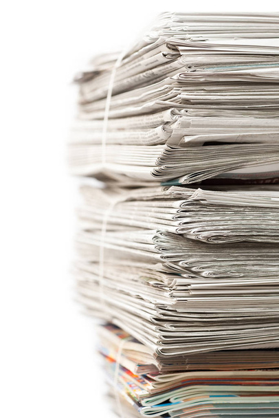 Big stack of newspapers on white background - Фото, изображение