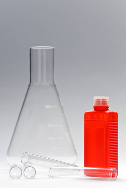 different chemistry and laboratory objects on white background - Foto, Imagem