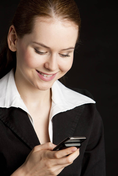 portrait of businesswoman with mobile - Photo, Image